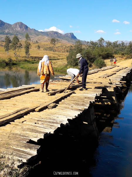 locals reparing bridge Andringitra Madagascar